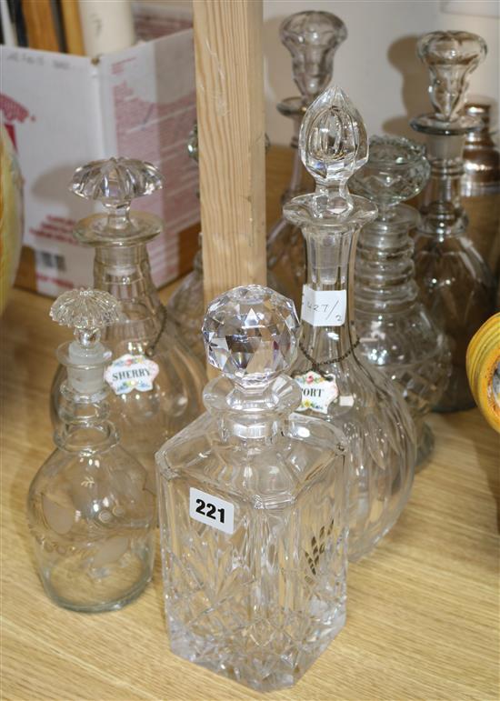 A collection of decanters and a cocktail shaker